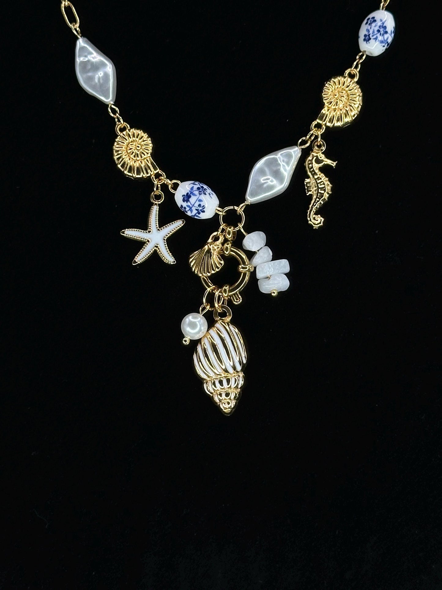 Gold Coastal Charm Necklace: Seahorse, Shells, Porcelain Bead
