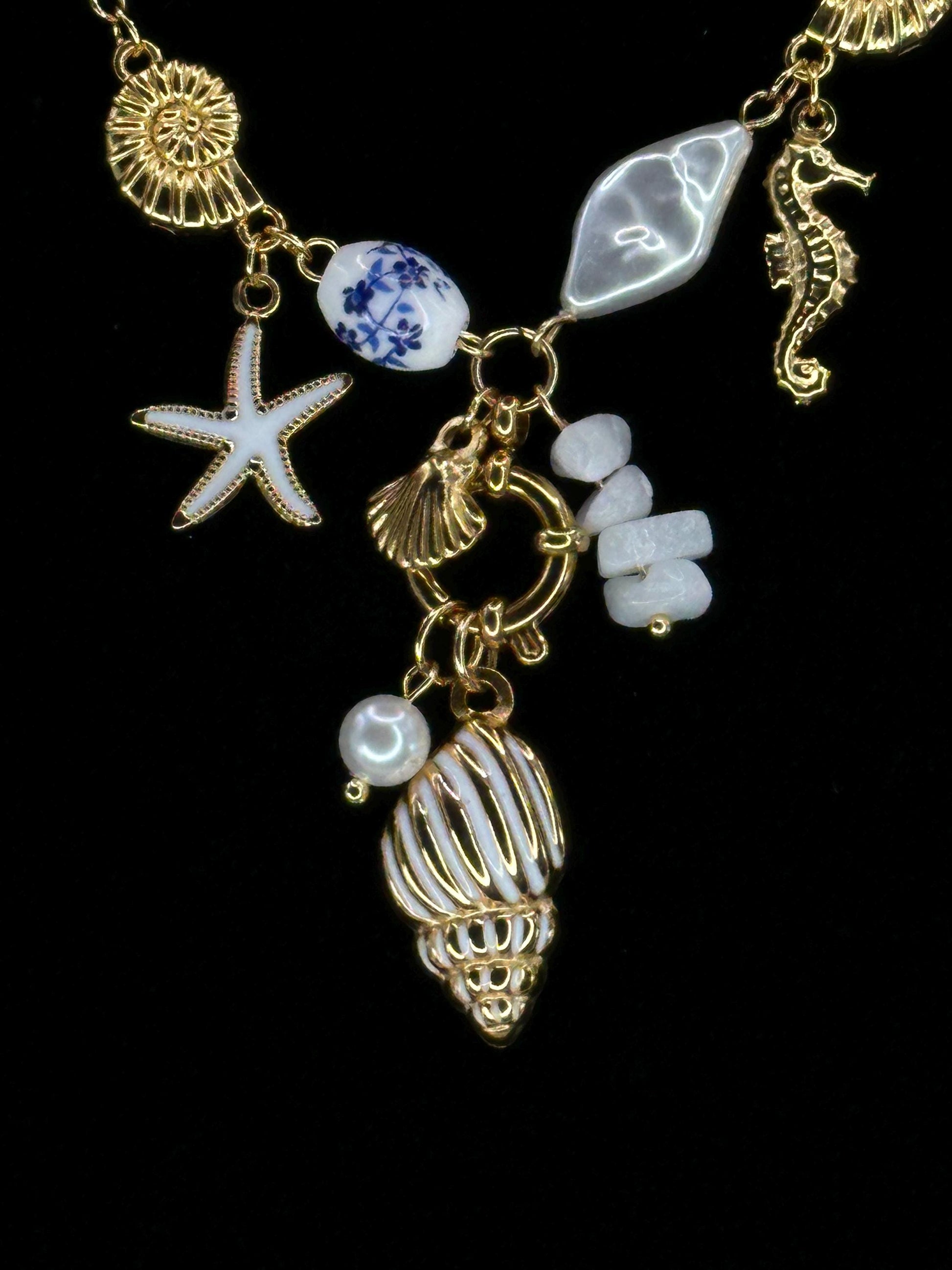Gold Coastal Charm Necklace: Seahorse, Shells, Porcelain Bead