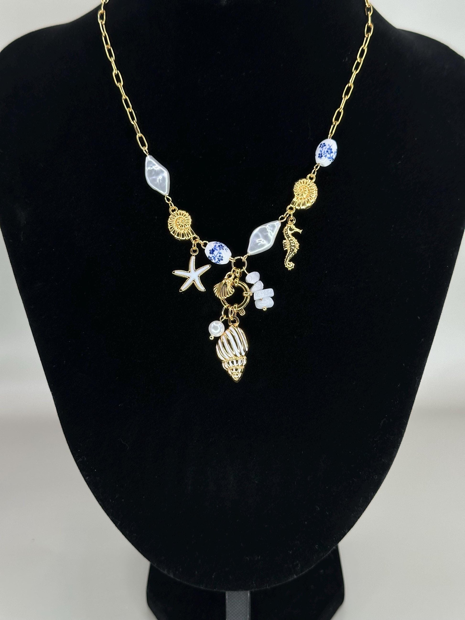 Gold Coastal Charm Necklace: Seahorse, Shells, Porcelain Bead