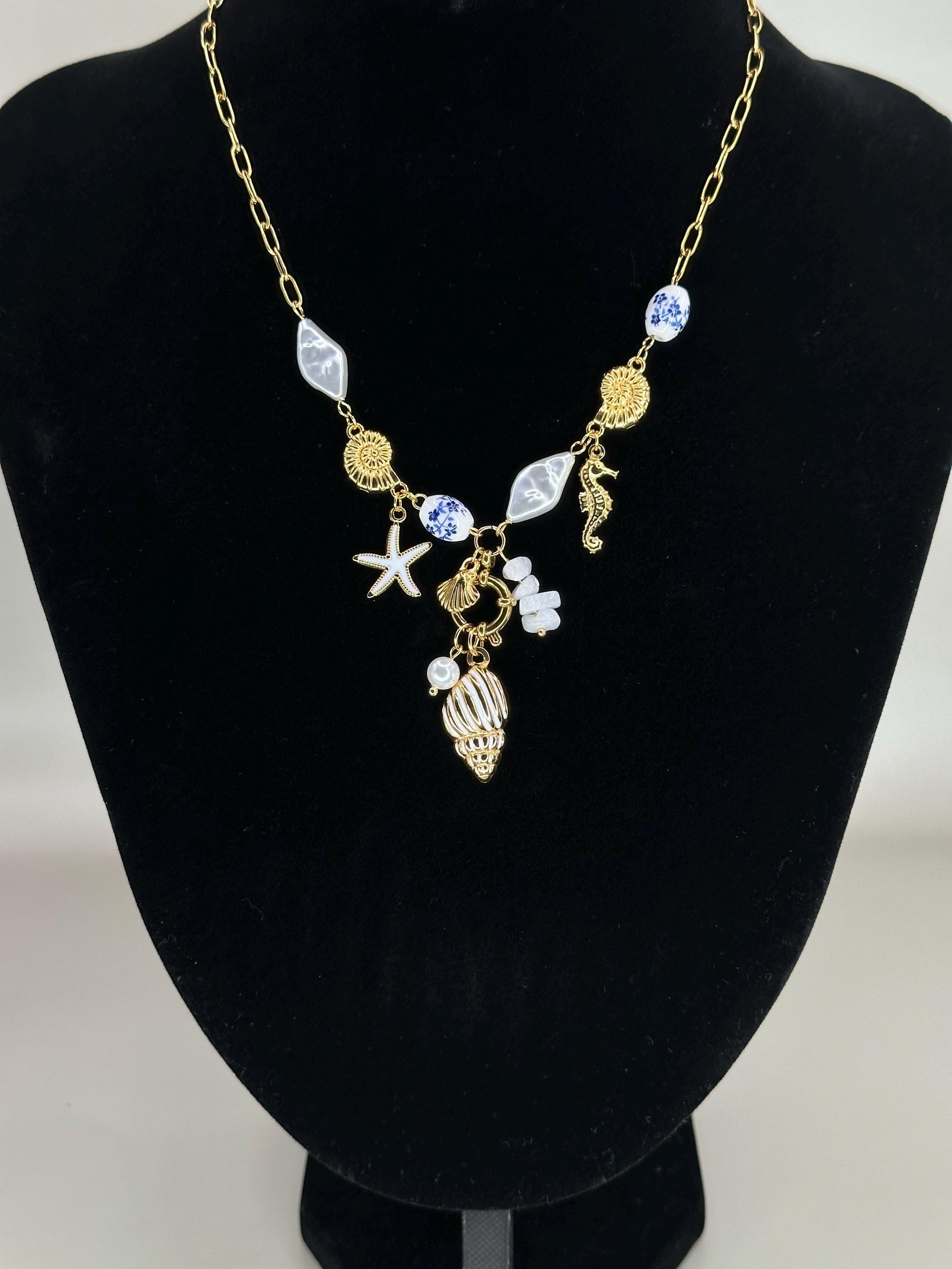 Gold Coastal Charm Necklace: Seahorse, Shells, Porcelain Bead